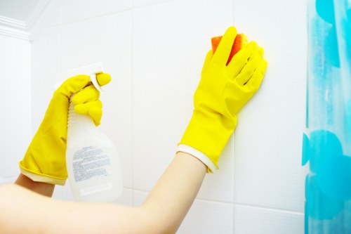 Professional technician cleaning upholstery
